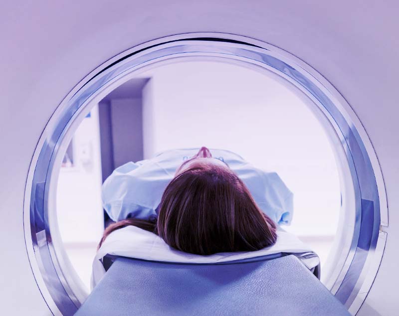 Woman going through the scanner